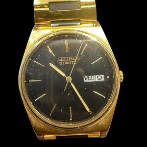 Seiko Gold and Black Watch with Day-Date